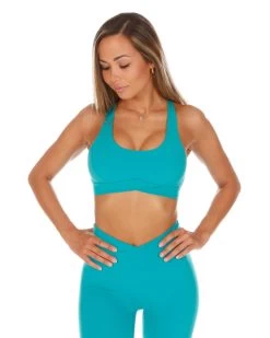 Elite Eleven Cross Over Sports Bra - Teal 7 Elite Eleven Cross Over Sports Bra - Teal -Fit Style Shop CROSS.SUM .1 8of197